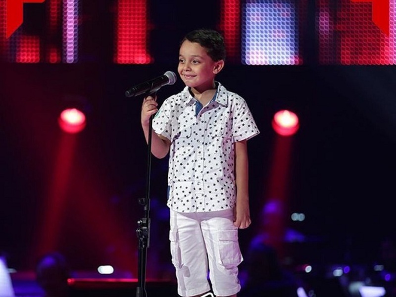 طفل يجعل نانسي عجرم وتامر حسني يغنون له في The Voice Kids